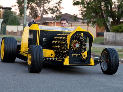 Comprised of more than 500,000 Lego pieces, this yellow-and-black hot rod can be driven at speeds of up to 17 mph.