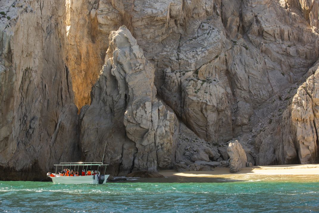 A beach below the rocks of Cabo San Lucas