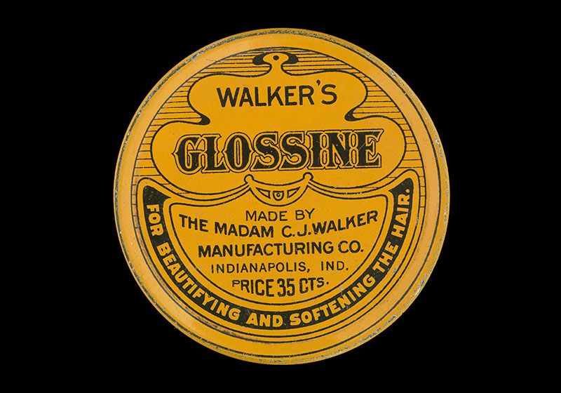 A round yellow tin. The top reads "Walker's Glossine"