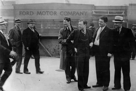 Before the blows began to rain: Walter Reuther (hand in pocket) and Richard Frankensteen (to Reuther’s left).