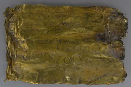 This 2,000-year-old scroll is covered with mysterious words in Aramaic.