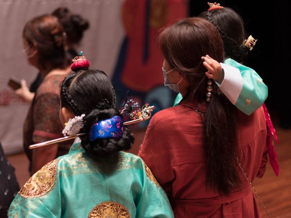 A family competing in a Korean Hanbok competition. thumbnail