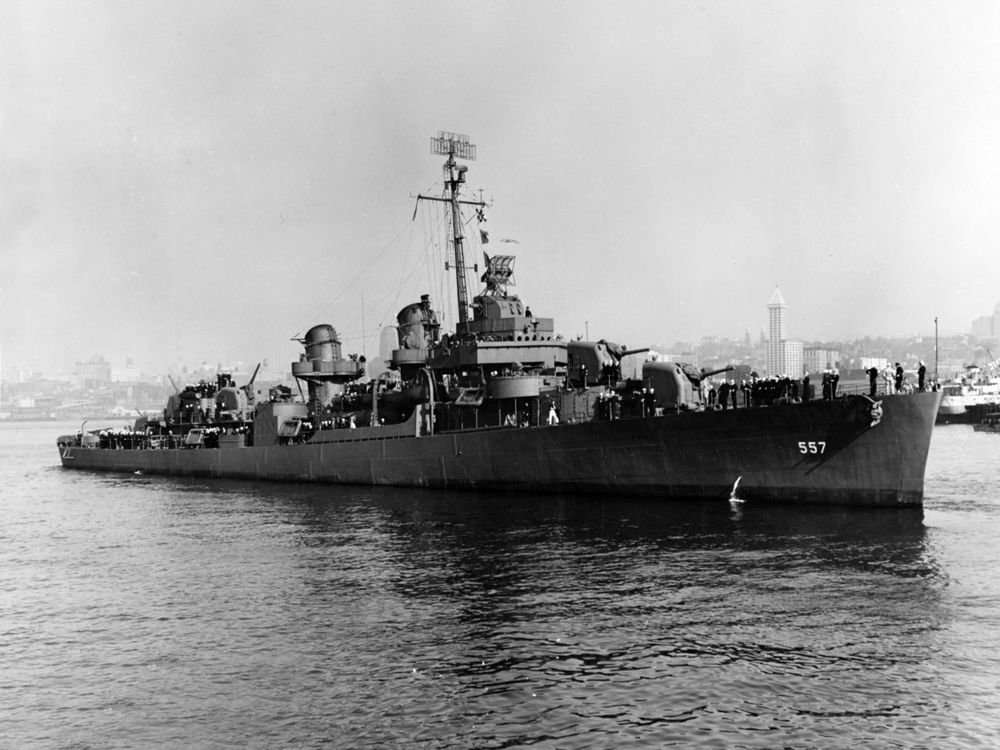 A black and white photo of the American Destroyer the USS Johnston off of Seattle's ports in 1943