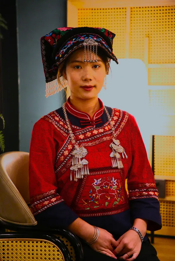 A young Buyi ethnic woman in red cloth thumbnail