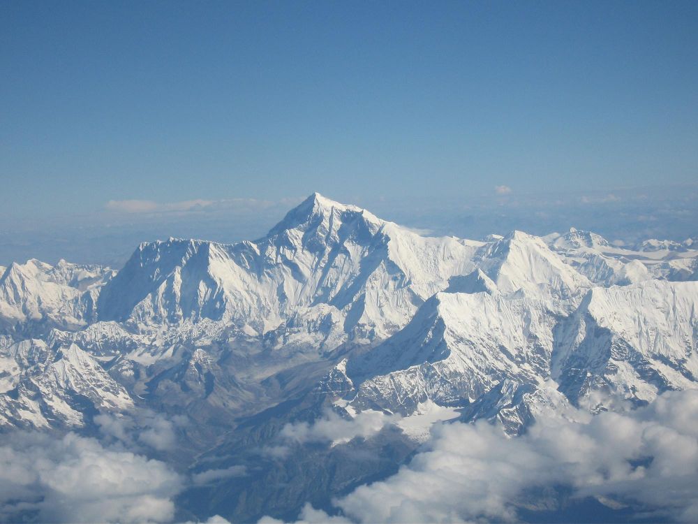A photo of Mount Everest covered in snow, taken from an aircraft