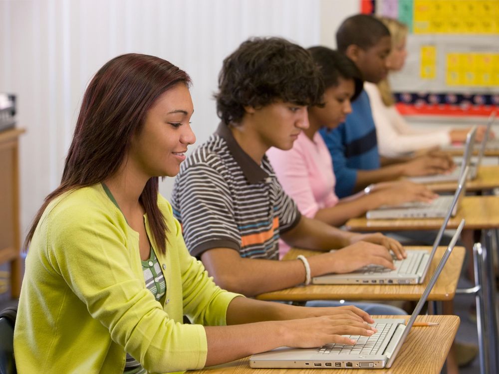 students on laptops