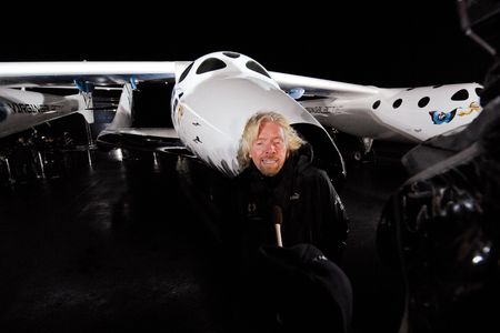 Billionaire Richard Branson is interviewed after unveiling Virgin Galactic's SpaceShipTwo in Mojave, California December 7, 2009.