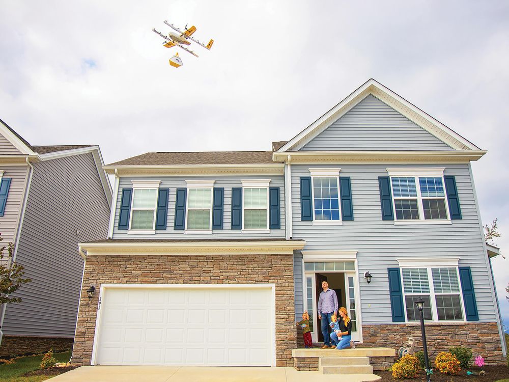 drone hovering over a house