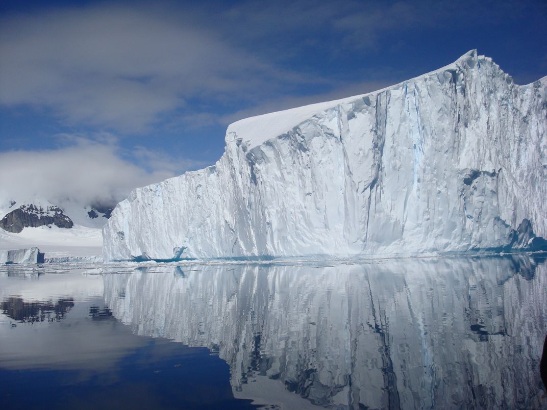 Reflection of an iceberg, Antarctica. Credit: Brenda Morris