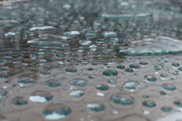 water drops on a patio table thumbnail