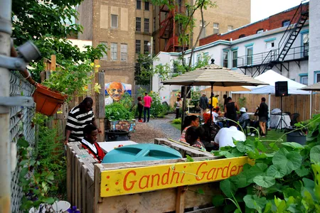Inspired by the quote “you must be the change you wish to see in the world, the artists of the S.A.G.E. Coalition in Trenton, New Jersey transformed an abandoned lot into a vibrant community garden and gathering space.

