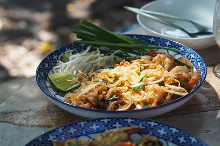 Pad thai&nbsp;is made by stir frying thin flat rice noodles in garlic, chai&nbsp;poh (Chinese sweet-salty preserved radish), dried shrimp and tofu, with a sauce made of ​fish sauce, tamarind paste and palm sugar.