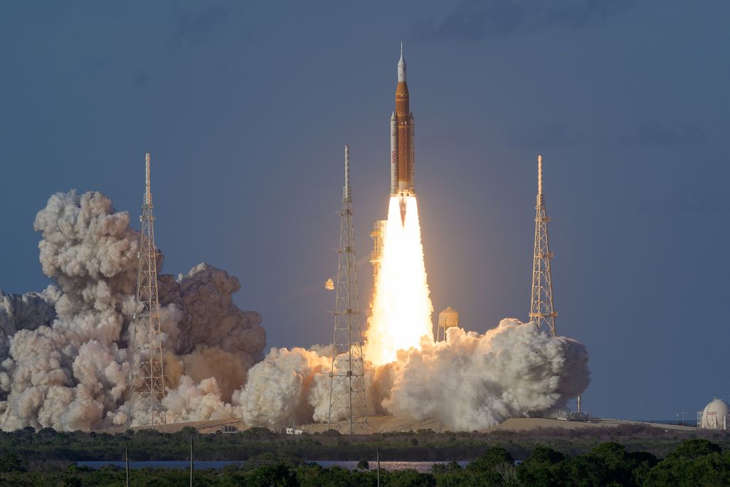 Artemis 2 launching with rocket fire and smoke