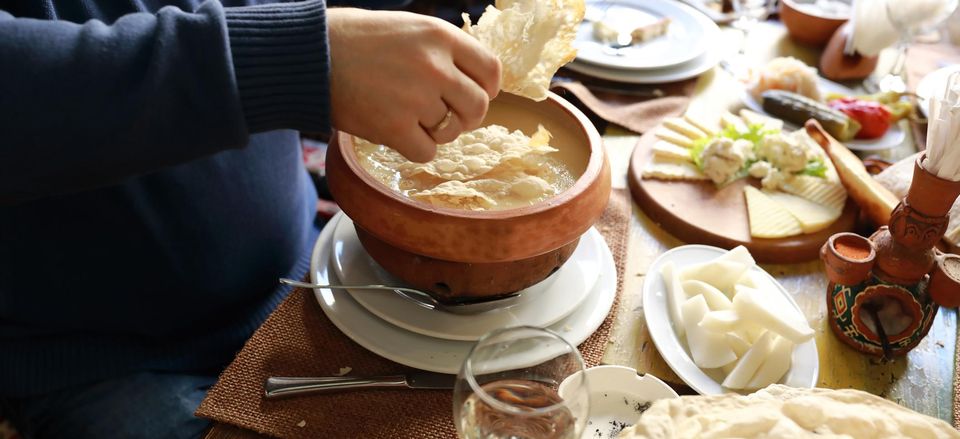  Dipping pita into khash 