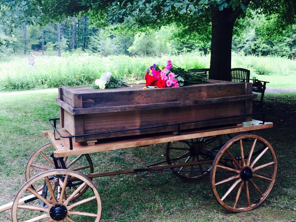 Casket made by father from recycled wood.jpg