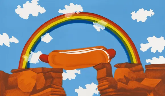 Bright print showing a hot dog bridge under a rainbow.