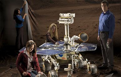 Engineers at NASA's Jet Propulsion Laboratory pose with a backup Mars Exploration Rover. From left: Nimisha Mittal, Pauline Hwang, Sharon Laubach, and Alfonso Herrera.