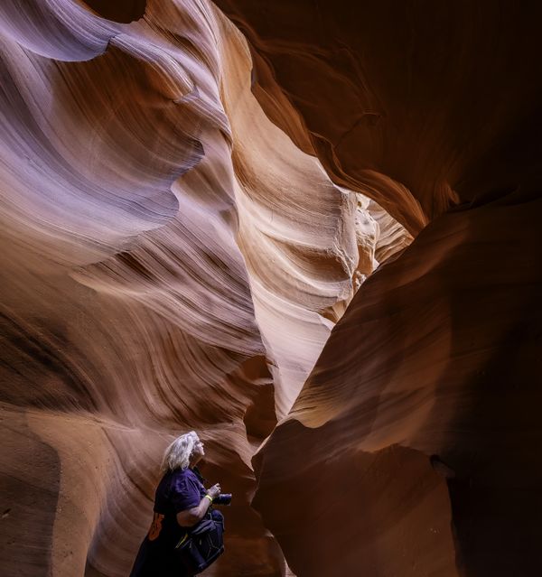 lady looks at light in antelope canyon x thumbnail