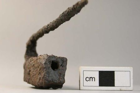 The front of one of the barb-spring padlocks recovered from the Pictish settlement at Lair in Glenshee, Scotland