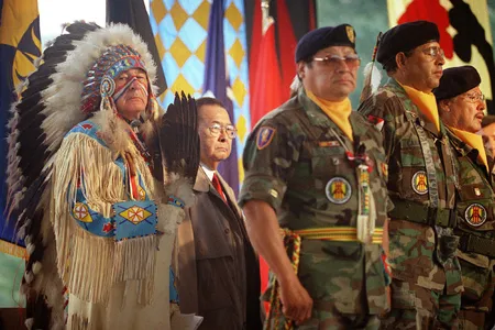 U.S. senators Ben Nighthorse Campbell, dressed in ceremonial Northern Cheyenne regalia, and Daniel K. Inouye, a member of the Senate Indian Affairs Committee, stand with Native American Vietnam veterans during the opening of the National Museum of the American Indian in 2004.