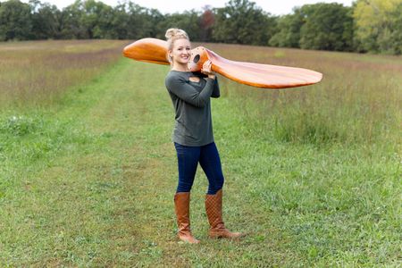 Alaina Lewis with the 90-inch mahogany propeller she made for a Bristol F.2 Fighter, her most challenging job to date.