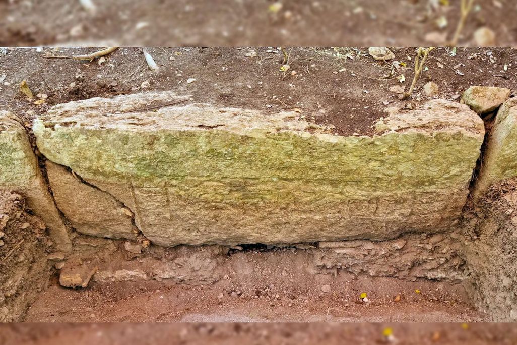 An inscribed stone found at the Ocomtún site
