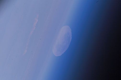 Space station astronauts get an odd view of the full Moon.