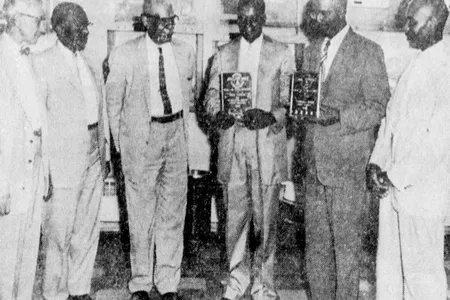 A 1959 photograph of William &quot;W.R.&quot; Saxon, who is standing third from left