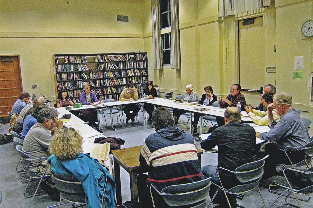 Reading group around a table