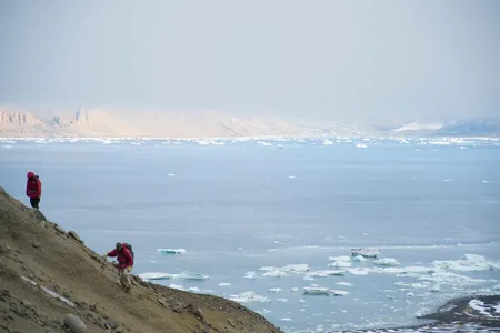 Chris Torres and Eric Gorscak take in the scenery at Cape Lamb—scenery that included lots of fossils. 