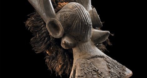 A Yukuben horizontal cap mask blends human and animal features.