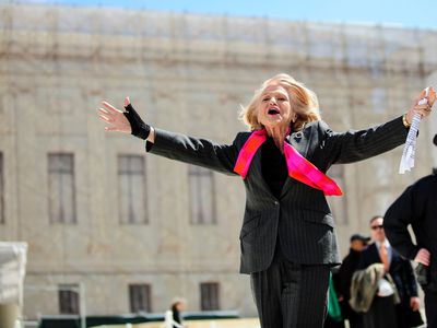 Edith Windsor on the steps of the Supreme Court in Washington, D.C., after the court heard arguments in her case against on the constitutionality the 1996 Defense of Marriage Act that defined marriage as only between a man and a woman.