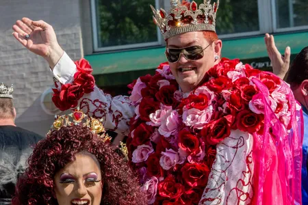 The King and Queen of Hearts wave from their parade float to crowds gathered for D.C. Capital Pride 2014. The next year, the Academy of Washington waved farewell after 54 years of service to the D.C. community.