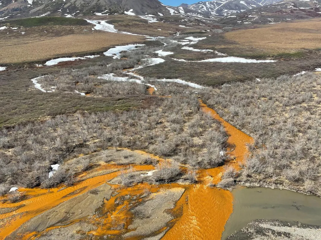 An orange tributary of the Kugororuk River