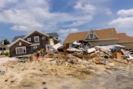 Houses on the New Jersey shore sit in ruins in July 2013, roughly eight months after Hurricane Sandy made landfall in the area.