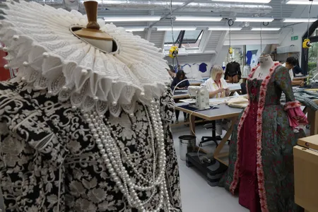 A worker sews a costume at the Royal Shakespeare Theatre in 2021 in Stratford-upon-Avon, England.