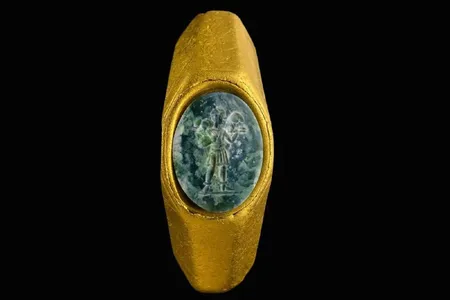 The ring bears an image of a shepherd boy with a sheep or ram on his shoulders, symbolizing Jesus as the "Good Shepherd."