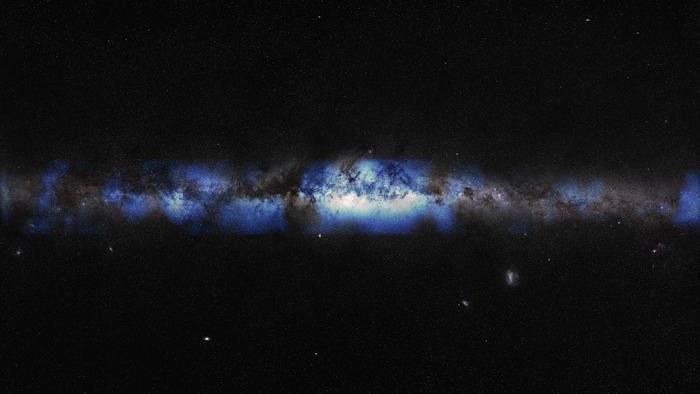 an artist's rendering of the milky way, with a blue glow depicting neutrinos