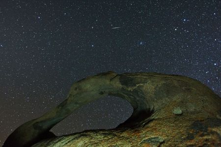 Geminids streak across the skies above the Alabama Hills. The approaching asteroid is thought to be the parent body of this annual meteor shower.