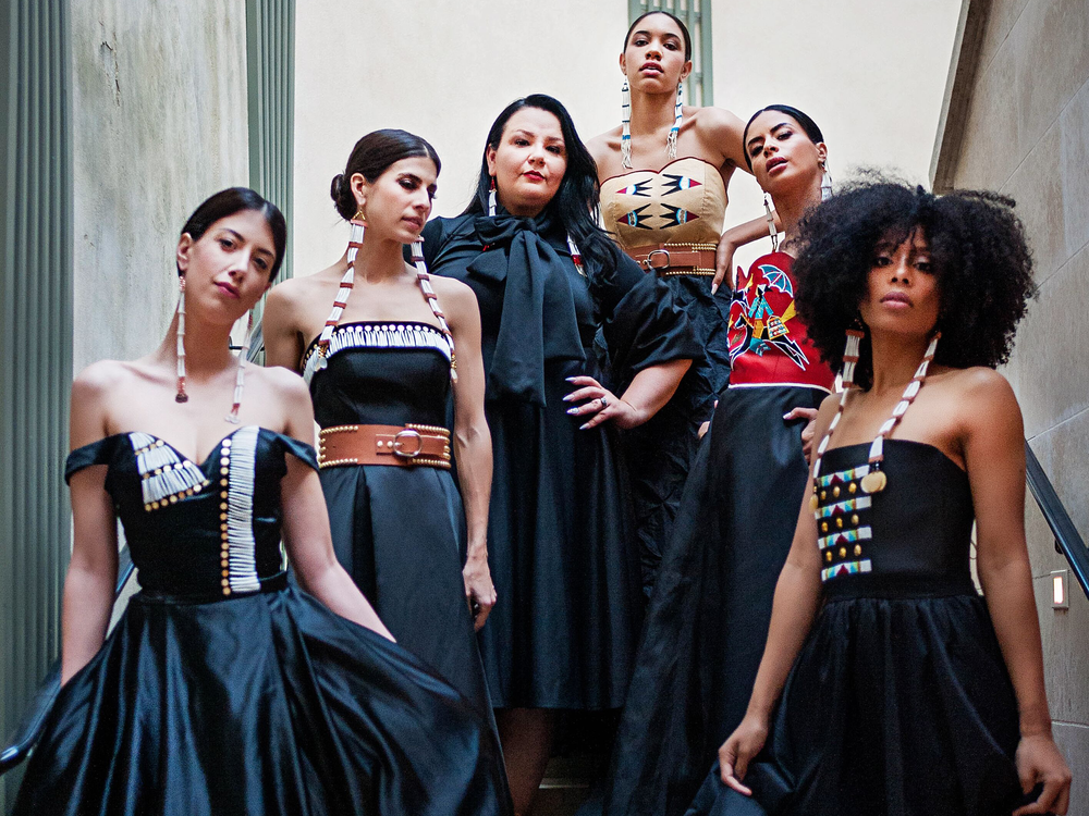 Norma Baker–Flying Horse (third from left) with models wearing her Red Berry Woman designs. Paris Fashion Week, March 2019. (Ulla Couture Photography)