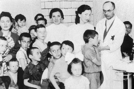 Jewish doctors give medical examinations in the Warsaw Ghetto