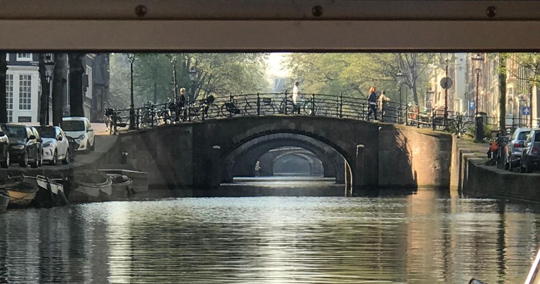 View of the bridges in Amsterdam during a canal tour