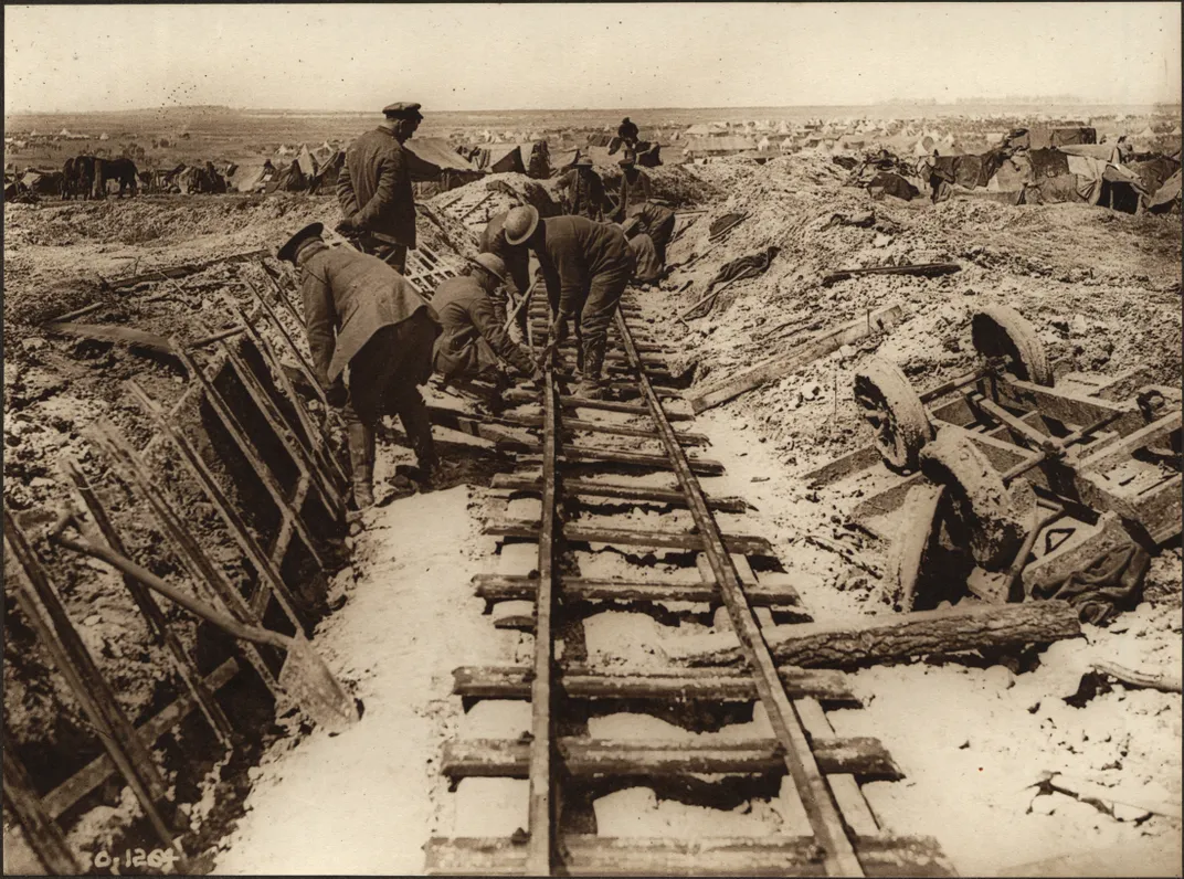 Canadian soldiers building a light railway