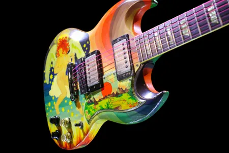Eric Clapton&#39;s guitar, called the &quot;Fool,&quot; features a bright, psychedelic design.