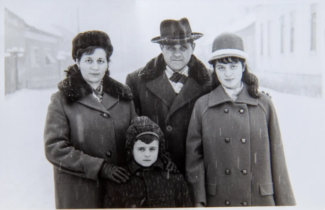 Weintraub Gilad's mother, Erica, as a child (right), with her brother Tomy and her parents, Samuel and Agi, in Romania in the 1960s