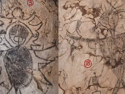 Researchers recently dated these two charcoal-drawn figures on the walls of Gua Sireh.