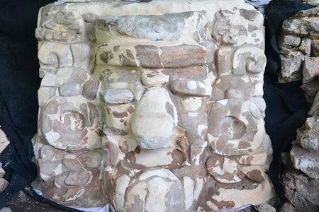 Researchers restored the mask before reburying it to protect against looters and erosion.