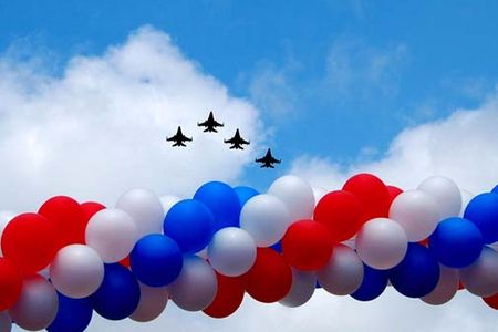 Four F-16 Fighting Falcons fly over Longmont, Colo., for a 4th of July celebration there. The aircraft are assigned to the Colorado Air National Guard�s 140th Wing located at Buckley Air Force Base, Colo.  (U.S. Air Force photo/Maj. Kristin Haley)