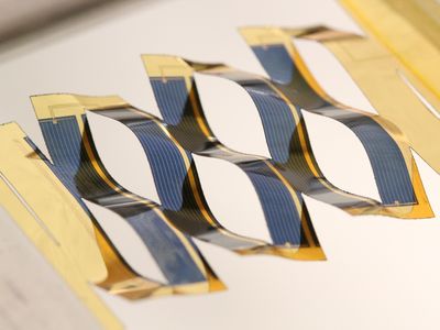 Kirigami-cut solar cells