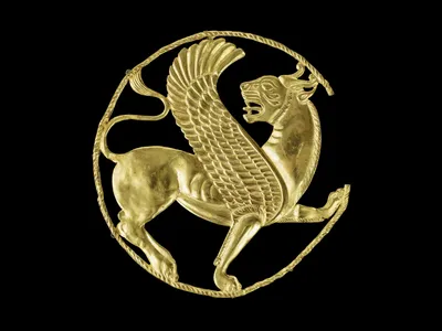 A gold Achaemenid plaque featuring a winged lion-griffin, dated to between 500 and 330 B.C.E.